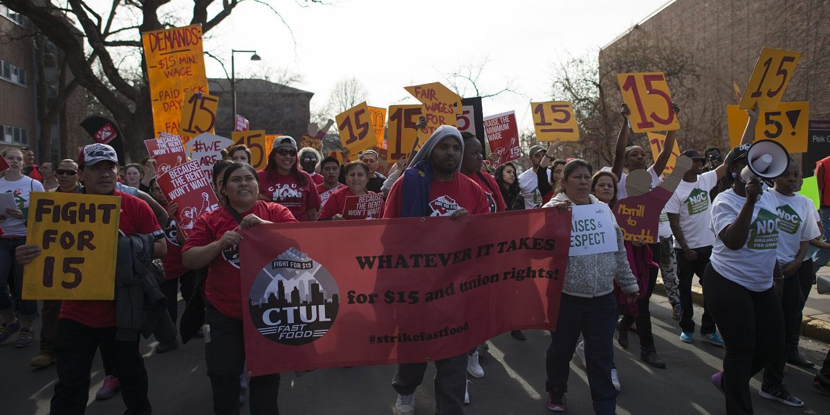 Franchise worker exploitation — minimum wage protest