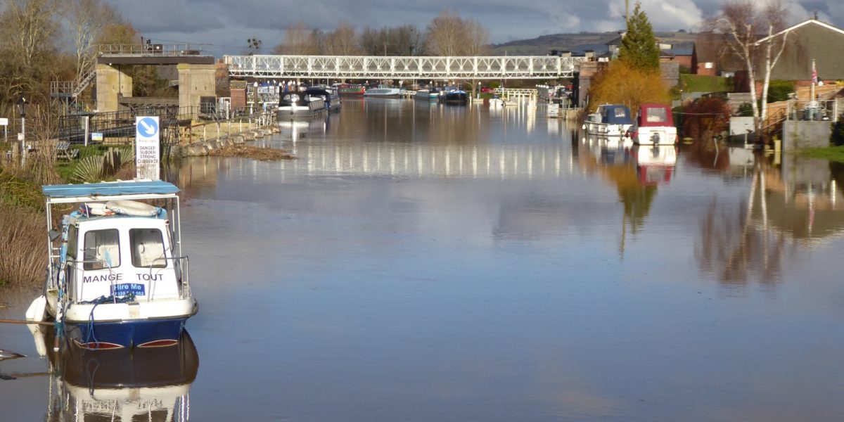 Storms and flooding — flooded river