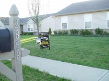 Home ownership — real estate sign