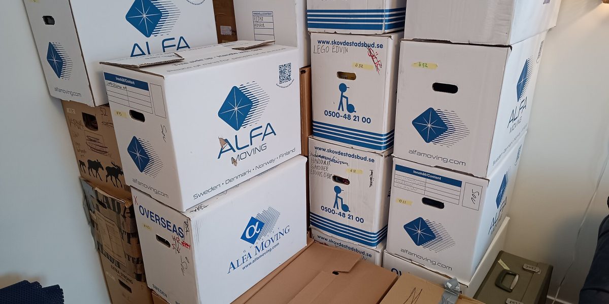 Downsizing from larger homes — moving boxes