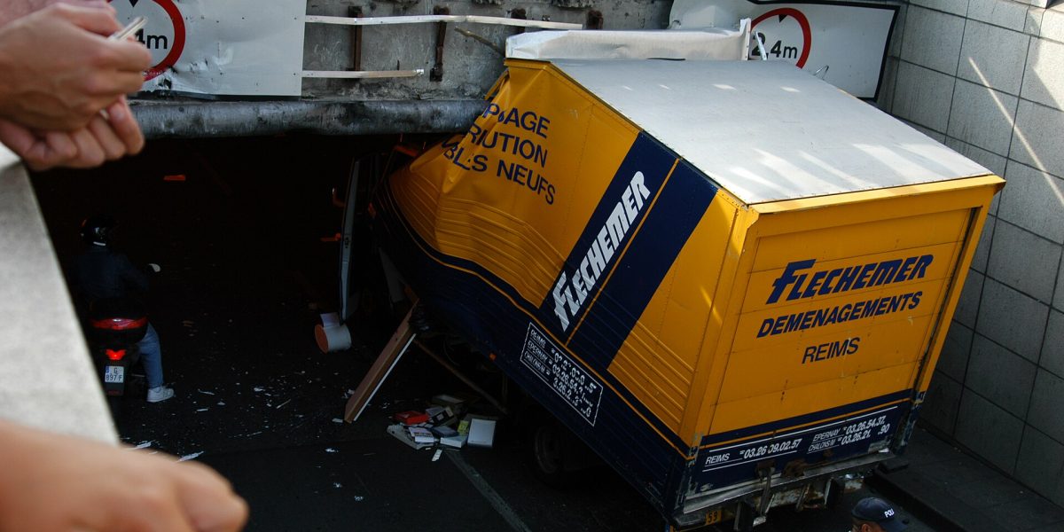 Overbridge strikes — truck crash